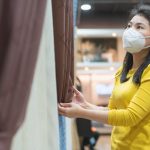 lady with mask dustry curtain with allergens